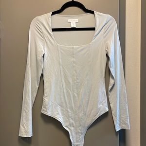 Light blue body suit